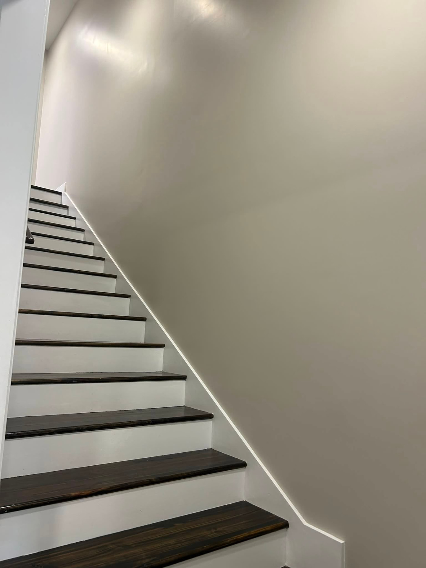 Same stairwell wall after a smooth finished paint job