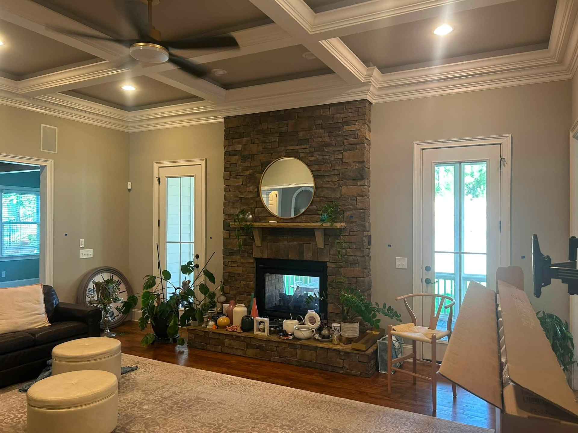 Dark stone fireplace before being painted